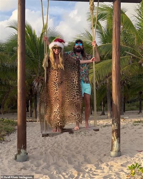 Heidi Klum, 50, poses TOPLESS on the beach in St. Barts